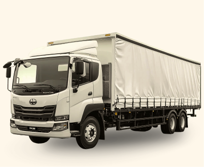 White commercial box truck with covered cargo area and six wheels.